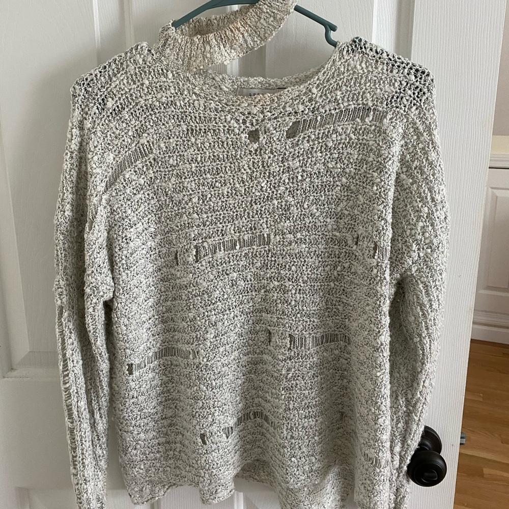 Distressed sweater